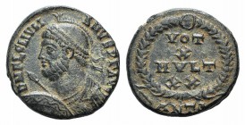 Julian II (360-363). Æ (18mm, 3.48g, 6h). Antioch, 361-3. Helmeted and cuirassed bust l. holding spear and shield. R/ VOT X MVLT XX, within wreath; AN...