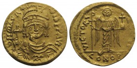 Maurice Tiberius (582-602). AV Solidus (21mm, 4.35g, 6h). Constantinople, 583/4-602. Helmeted, draped and cuirassed bust facing, holding globus crucig...