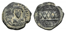 Phocas (602-610). Æ 40 Nummi (31mm,13.46g, 6h). Constantinople, year 8 (609/10). Crowned bust facing, wearing consular robes, holding mappa and crucif...
