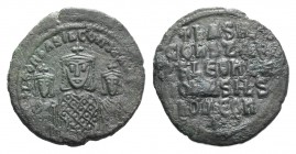 Basil I with Constantine and Leo VI (867-886). Æ 40 Nummi (27mm, 7.93g, 6h). Constantinople. Crowned half-length figures of Basil, wearing loros, betw...
