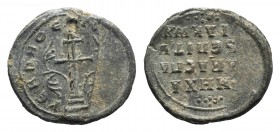 Michael, Protospatharios, c. 10th Century AD. PB Seal (24mm, 5.71g, 11h). Ornate double cross on steps ste on globe and within ornate frame. R/ MIXA[…...