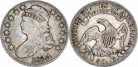 États-Unis - 50 Cents (1/2 DollAr) 1824 Capped Bust, Philadelphia.
A/ Buste de la liberté à gauche.
R/ UNITED STATES OF AMERICA ,
Aigle aux ailes dépl...