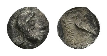 Yehud Era (ca. 375-260 BC). AR quarter ma'ah obol.
Obv: Facing head in a circle...