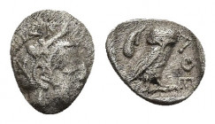ATTICA. Athens. Obol (Circa 454-404 BC).
Obv: Helmeted head of Athena right.
Rev: AΘE.
Owl standing right, head facing; olive sprig and crescent to...