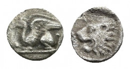 TROAS. Assos. Obol (Circa 479-450 BC).
Obv: Griffin seated left.
Rev: ? - ?.
Head of lion left within incuse square.
SNG von Aulock -; SNG Copenha...