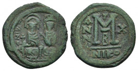 JUSTIN II (565-578). Follis. Nicomedia. Dated RY 10 (574/75).
Obv: D N IVSTINVS P P AVC.
Justin, holding globus cruciger, and Sophia, holding crucif...