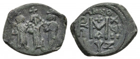 HERACLIUS (610-641). Follis. Kyzikos.
Obv: Heraclius in the middle; to left, Martina; to right, Heraclius Constantine; each standing facing, wearing ...