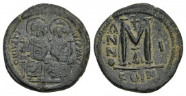 Justin II and Sophia (565-578). Æ 40 Nummi. Constantinople, year 1 (565/6).
Obv: Justin and Sophia, both nimbate, seated facing.
Rev: Large M; cross...