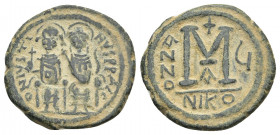JUSTIN II (565-578). Follis. Nicomedia. Dated RY 5 (569/70).
Obv: D N IVSTINVS P P AVC.
Justin, holding globus cruciger, and Sophia, holding crucifo...