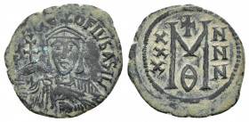 THEOPHILUS (829-842). Follis. Constantinople.
Obv: ΘΕΟFΙL' BASIL'.
Crowned, draped and cuirassed bust facing, holding patriarchal cross and akakia....