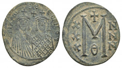 MICHAEL II THE AMORIAN with THEOPHILUS (820-829). Follis. Constantinople.
Obv: MIXAHL S ΘЄOFILOS.
Crowned facing busts of Michael and Theophilus; cr...