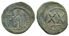 PHOCAS with LEONTIA (602-610). Half Follis. Thessalonica. Obv: δ M FOCA ЄRP AVG. Phocas, holding globus cruciger, and Leontia, holding cruciform scept...