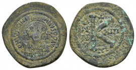 JUSTINIAN I (527-565). Half Follis. Constantinople. Dated RY 13 (539/40). Obv: D N IVSTINIANVS P P AVG. Helmeted and cuirassed bust facing, holding gl...