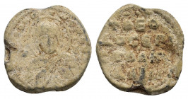 BYZANTINE LEAD SEALS. Theodosios, monachos (Circa 1050).
Obv: MP ΘV.
Bust of the Theotokos facing, orans with Christ medallion on breast.
Rev:Legen...