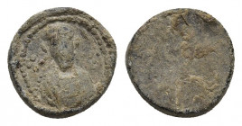 UNCERTAIN (Circa 4th-5th centuries). Lead Seal. Obv: Draped and cuirassed facing bust; uncertain letters around; all within incuse square. Rev: Blank ...
