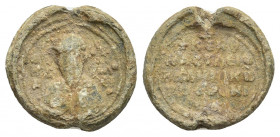 BYZANTINE LEAD SEALS. (Circa 875-950).
Obv: Bust of St. Nikolaos facing, holding Gospels.
Rev: Legend in five lines.
.
Condition: Very fine.
Weig...