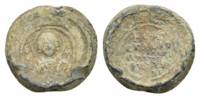 BYZANTINE LEAD SEALS. Uncertain (Circa 11th century).
Obv: Facing bust of St. George, holding spear and shield.
Rev: Legend in five lines.
.
Condi...