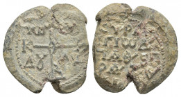 BYZANTINE LEAD SEALS.(Circa 9th-10th centuries).
Obv: Tω - Cω / ΔɄ - Λω. Cruciform monogram.
Rev: Legend in four lines. .
.
Condition: fine.
Weig...