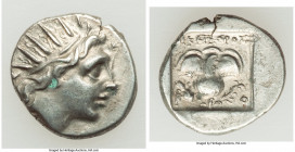 CARIAN ISLANDS. Rhodes. Ca. 88-84 BC. AR drachm (15mm, 2.45 gm, 11h). XF. Plinthophoric standard, Nicephorus, magistrate. Radiate head of Helios right...