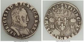 Charles IX, in the Name of Henri II Teston 1562-L VF, Bayonne mint, Dup-1052. 27.0mm. 9.20gm. HENRICVS. II. DG FRANCOR. REX. moon His bust right / + X...