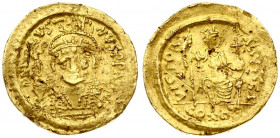 Byzantine Empire 1 Solidus Justin I (518-527). Obverse: Helmeted and cuirassed bust facing three-quarters to right; holding spear over shoulder and sh...