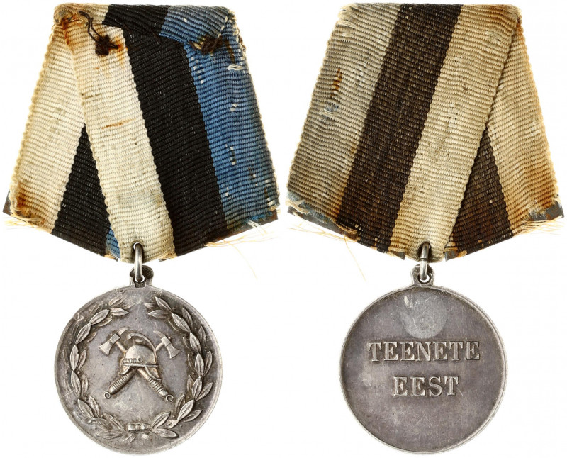 Estonia Medal (1937) for Merit in the Fire Service. Circular silver medal with l...