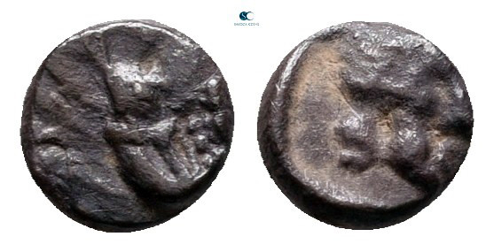 Caria. Uncertain mint circa 450-400 BC. 
Tetartemorion AR

6 mm, 0,24 g


...