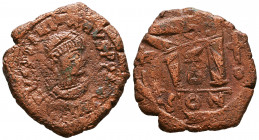 Justinian I the Great (AD 527-565). Æ follis.

Weight: 16,7 gr
Diameter: 34,4 mm