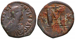Justin I & Justinian I. 527. Æ Follis.

Weight: 11 gr
Diameter: 29,5 mm