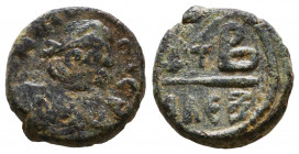 Justinian I 527-565 AD. AE Dodecanummium.

Weight: 4,1 gr
Diameter: 15,4 mm