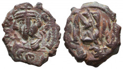 HERACLIUS. 610-641 AD. Æ Follis.

Weight: 5 gr
Diameter: 23,3 mm