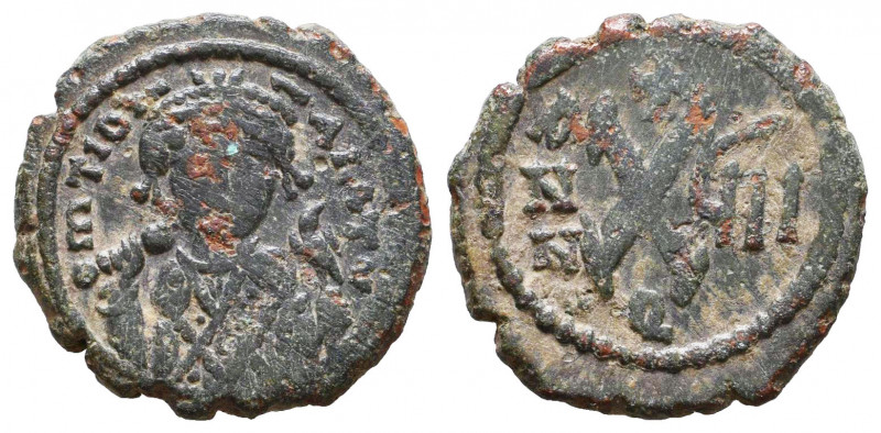Maurice Tiberius AD 582-602. Struck circa AD 583-585. AE half follis.

Weight:...