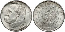 Piłsudski 10 złotych 1938 Praktycznie nieobiegowy, nieznaczne przetarcie reliefu u góry awersu (na tyle lekkie, że nie powinno być przeszkodą w uzyska...