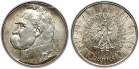 Piłsudski 10 złotych 1938 Moneta w pudełku GCN, wg. naszej opinii w stanie zachowania 2. Ładna, świeża. Reference: Chałupski 2.32.5.a (R), Parchimowic...