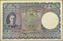 CEYLON. Government of Ceylon. 10 Rupees, August 4th, 1943. P-36A. Very Fine.

With "This Note is Legal Tender....." text. An ink stamp on the revers...