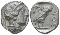 Attica, Athens Tetradrachm After 449, AR 24.00 mm., 17.08 g.
Head of Athena r., wearing Attic helmet decorated with olive leaves and palmette. Rev. O...