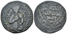 Mayafiriqin, Dirhem circa 1215, Æ 30.00 mm., 11.60 g.
Facing male figure, seated and holding globus. Rev. Arabic inscription. Balog, Ayyubids 257,851...
