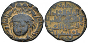 , Dirham 1149-1170, Æ 27.00 mm., 13.02 g.
Male bust with Turkish features facing slightly l., hair in knot at forehead; two winged creatures above. R...