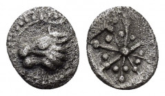 ASIA MINOR.Uncertain.(5th-4th century BC).Hemiobol. 

Obv : Head of horned lion (?) left .

Rev : Incuse square divided into eight sections each conta...