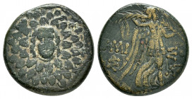 PONTUS.Amisos.(Circa 105-63 BC).Ae.

Obv : Aegis with Gorgon's head at center.

Rev : AΜΙΣΟΥ.
Nike advancing right, holding wreath and palm branch, be...