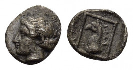 TROAS.Assos.(4th-3rd centuries BC).Obol. 

Obv : Female head left.

Rev : Head of griffin left within linear border in incuse square.
RARE. 

Conditio...