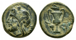 MYSIA.Lampsakos.(Circa 190-85 BC).Ae.

Obv : Head of Priapos left.

Rev : kantharos

Condition : Nice green patina.Very fine.

Weight : 2.5 gr
Diamete...