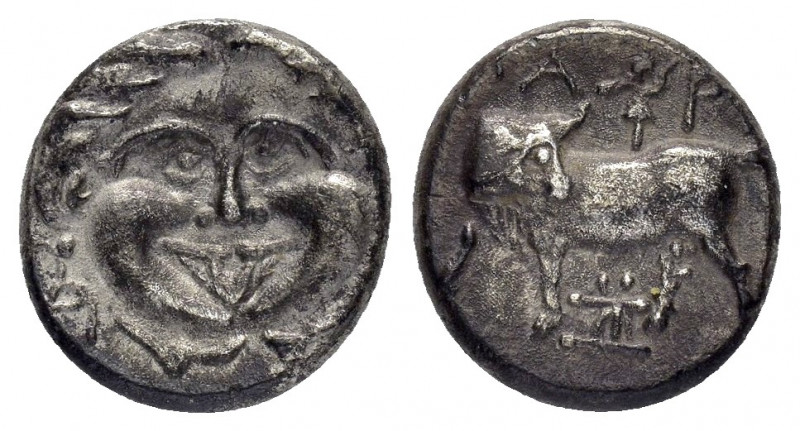 MYSIA.Parion.(4th century BC).Hemidrachm.

Obv : Gorgoneion.

Rev : Bull standin...
