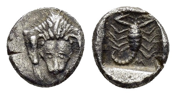 CARIA.Mylasa.(Circa 450-400 BC).Obol.

Obv : Facing lion’s scalp.

Rev : Sco...