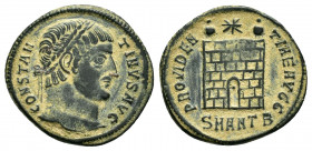 CONSTANTINE I.(307-337).Antioch.Follis. 

Obv : CONSTANTINVS AVG.
Laureate head right.

Rev : PROVIDENTIAE AVGG / SMANTB.
Camp gate with two turrets, ...