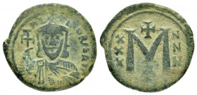LEO V.(813-820).Constantinople.Follis. 

Obv : LЄOҺ ЬASIL.
Crowned and draped facing bust, holding cross potent. 

Rev : Large M, XXX - NNN scross fie...