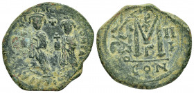 HERACLIUS with HERACLIUS CONSTANTINE.(610-641).Constantinople.Follis. 

Obv : Heraclius and Heraclius Constantine standing facing, each crowned and ho...