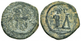 MAURICE TIBERIUS with CONSTANTIA and THEODOSIUS.(582-602).Cherson.Pentanummia.

Obv : d N maVRIC PP AG.
Maurice, holding globus cruciger, and Constant...
