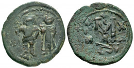 HERACLIUS and HERACLIUS CONSTANTINE.(613-641).Constantinople.Follis.

Obv : Heraclius, bearded, on left, and Heraclius Constantine, on right, standing...