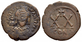 TIBERIUS II CONSTANTINE.(578-582).Constantinople.Half Follis. 

Obv : DM TIB CONTANT PP AV.
Crowned and cuirassed bust facing, holding cross on globe ...